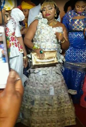 Woman Becomes Internet Sensation For Wearing ‘Dollar Dress’ At Event(Photos)
